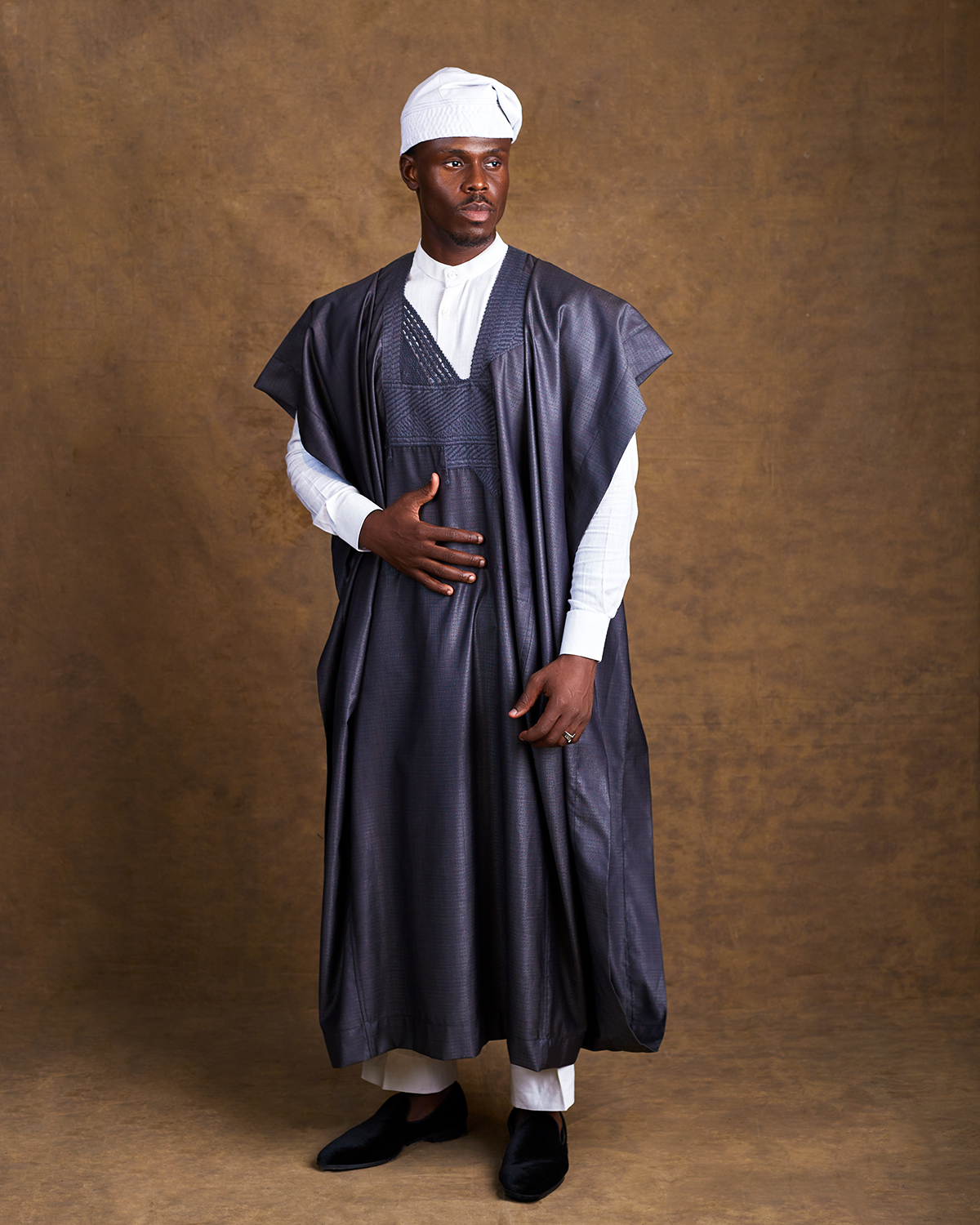 Oxgital product photography showcasing Orí Adé's handcrafted caps and traditional Nigerian menswear.