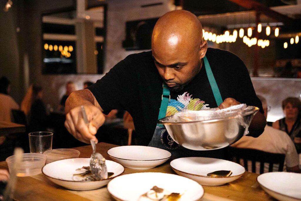A man showing his food recipe