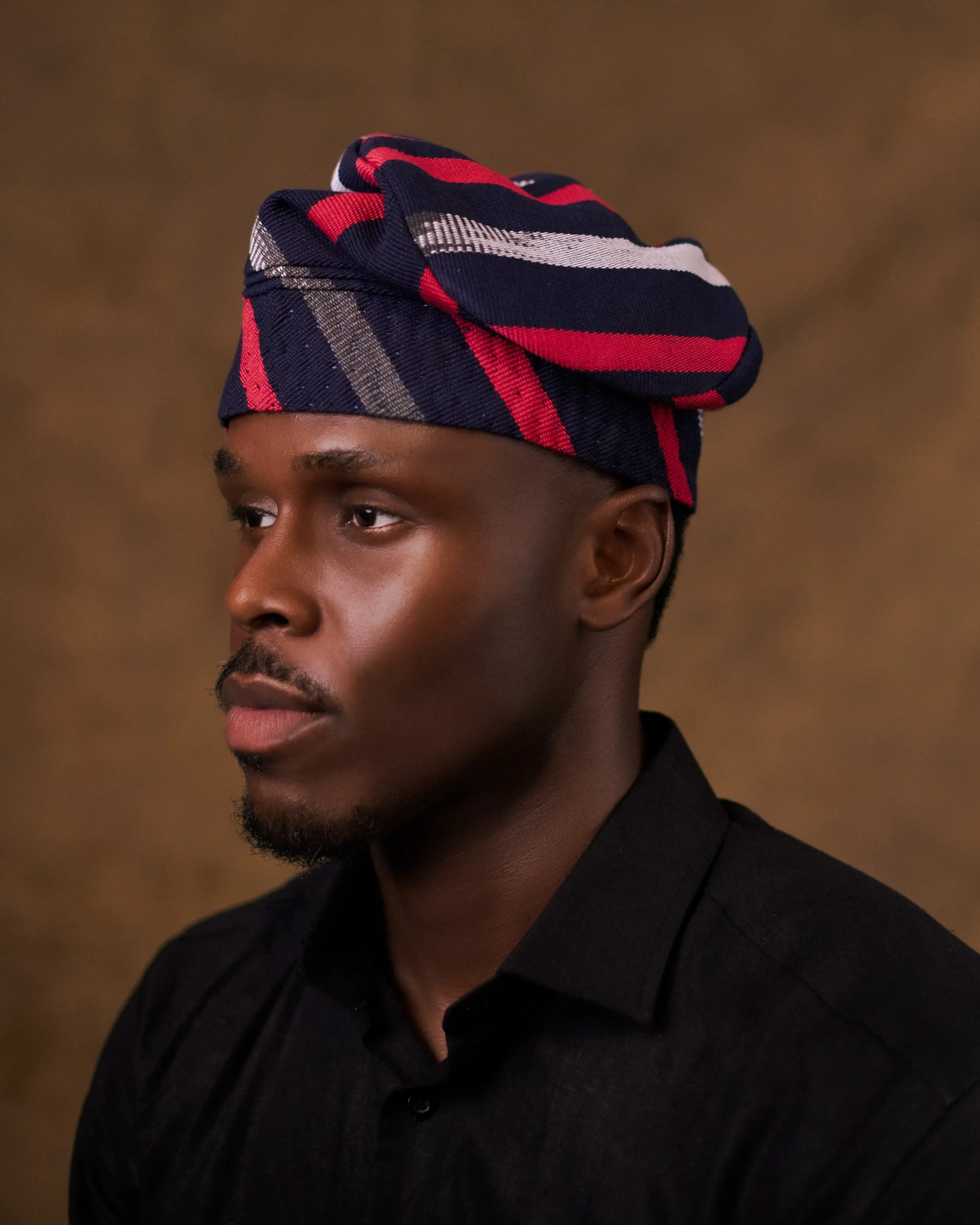 Orí Adé handcrafted Yoruba caps photographed by Oxgital for the Nigerian menswear brand.