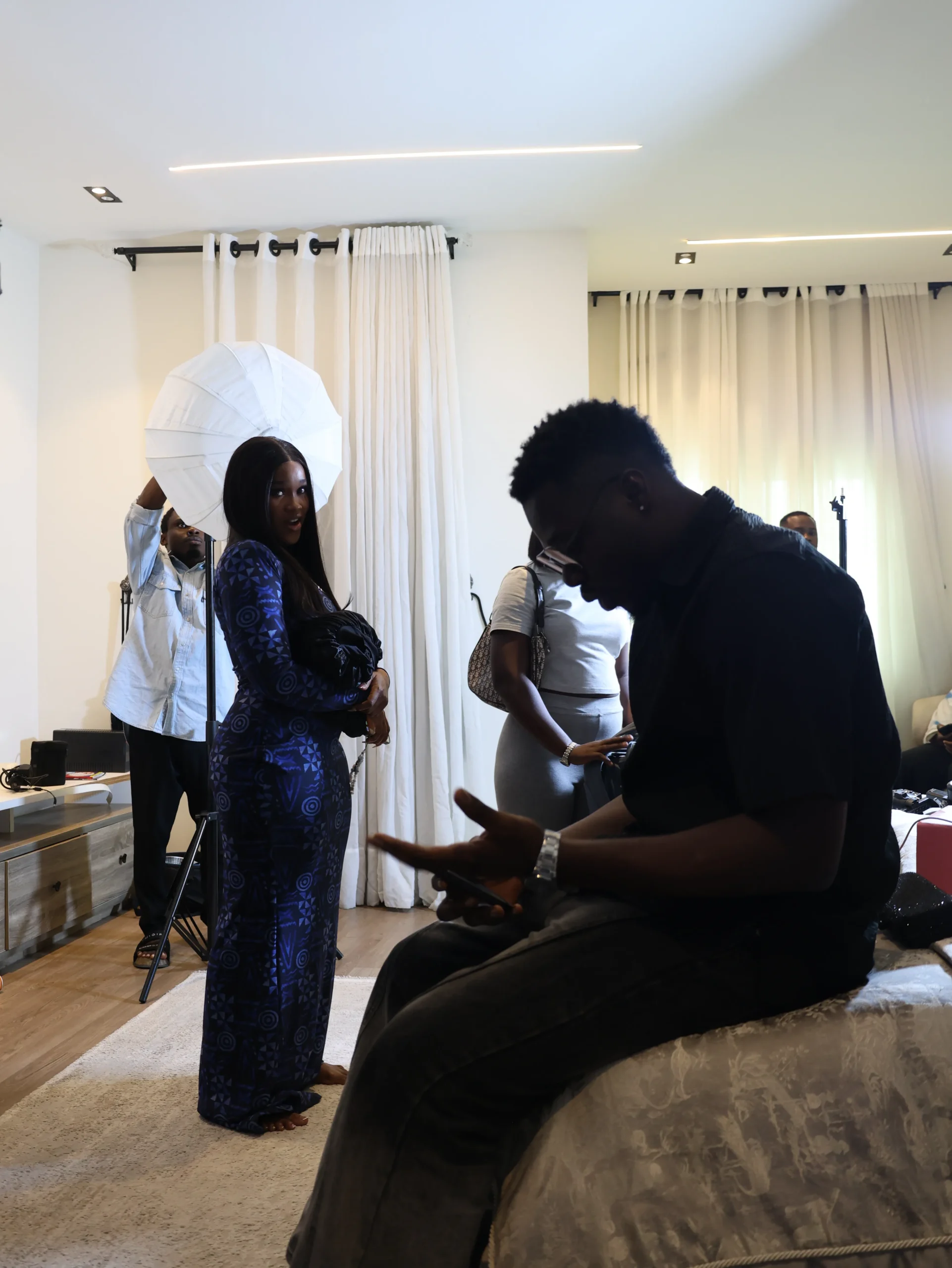 Behind-the-scenes view of Cee-C's promotional photoshoot and video production with Oxgital.